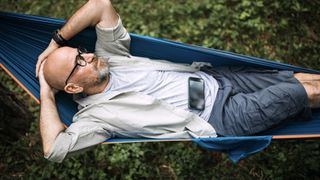 Man napping in a hammock