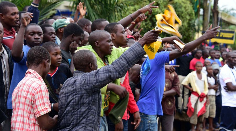 The crowds cheer on the riders at the start