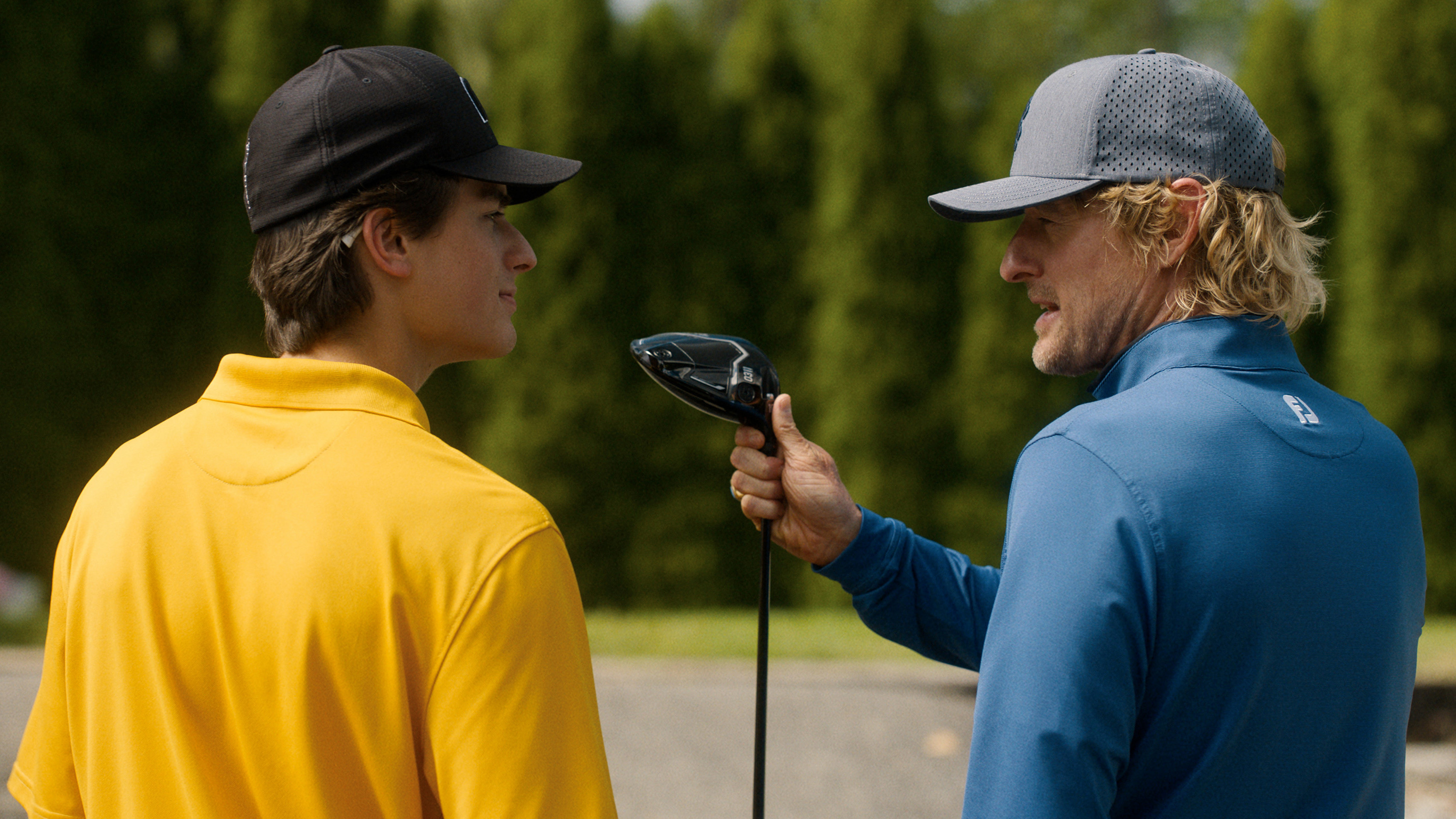 Peter Dager as Santi Wheeler and Owen Wilson as Pryce Cahill in Stick.