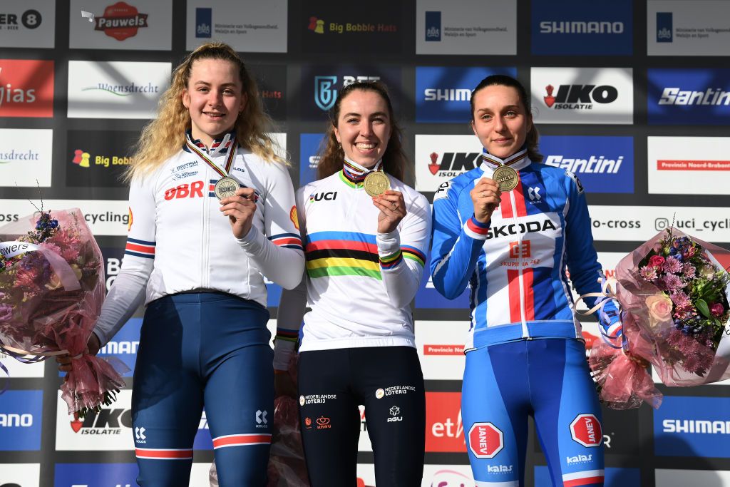 HOOGERHEIDE NETHERLANDS FEBRUARY 05 Silver medalist Zoe Backstedt of Great Britain gold medalist Shirin Van Anrooij of The Netherlands and bronze medalist Kristyna Zemanova of Czech Republic pose on the podium during the medal ceremony after the 74th World Championships CycloCross 2023 Womens U23 CXWorldCup Hoogerheide2023 on February 05 2023 in Hoogerheide Netherlands Photo by David StockmanGetty Images