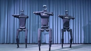 3 robots captured in a still taken from the youtube video demonstrating the bipedal robot.