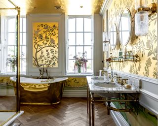 Golden bathroom with white walls, wooden flooring