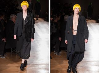A separate view of the same catwalk but different models front on view, both with yellow hair