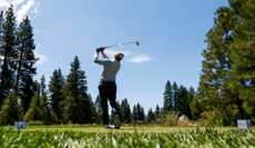 Charley Hoffman watches his tee shot after striking the golf ball