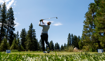 Charley Hoffman watches his tee shot after striking the golf ball