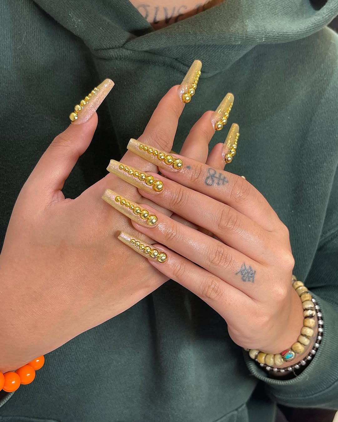 gold coffin nails