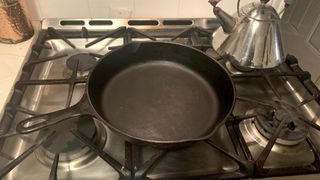 Cast iron skillet on oven hob