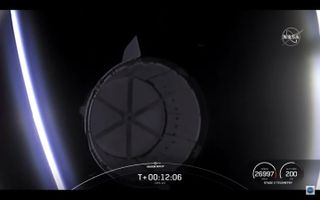 SpaceX's robotic Dragon cargo capsule separates from the upper stage of its Falcon 9 rocket on Aug. 29, 2021.