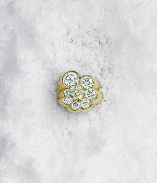 diamond and gold jewellery against snow