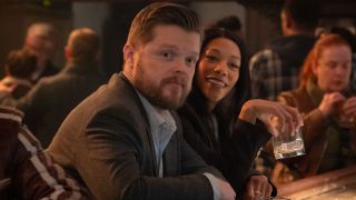 (L-R): Foggy Nelson (Elden Henson) and Kirsten Mcduffie, ADA (Nikki M. James) sitting together in a bar looking forward. 