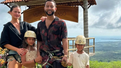 Chrissy Teigen poses with John Legend and kids in Mexico