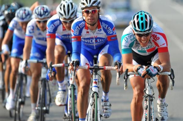 Philippe Gilbert takes a turn at the front, followed by Kevin Van Impe