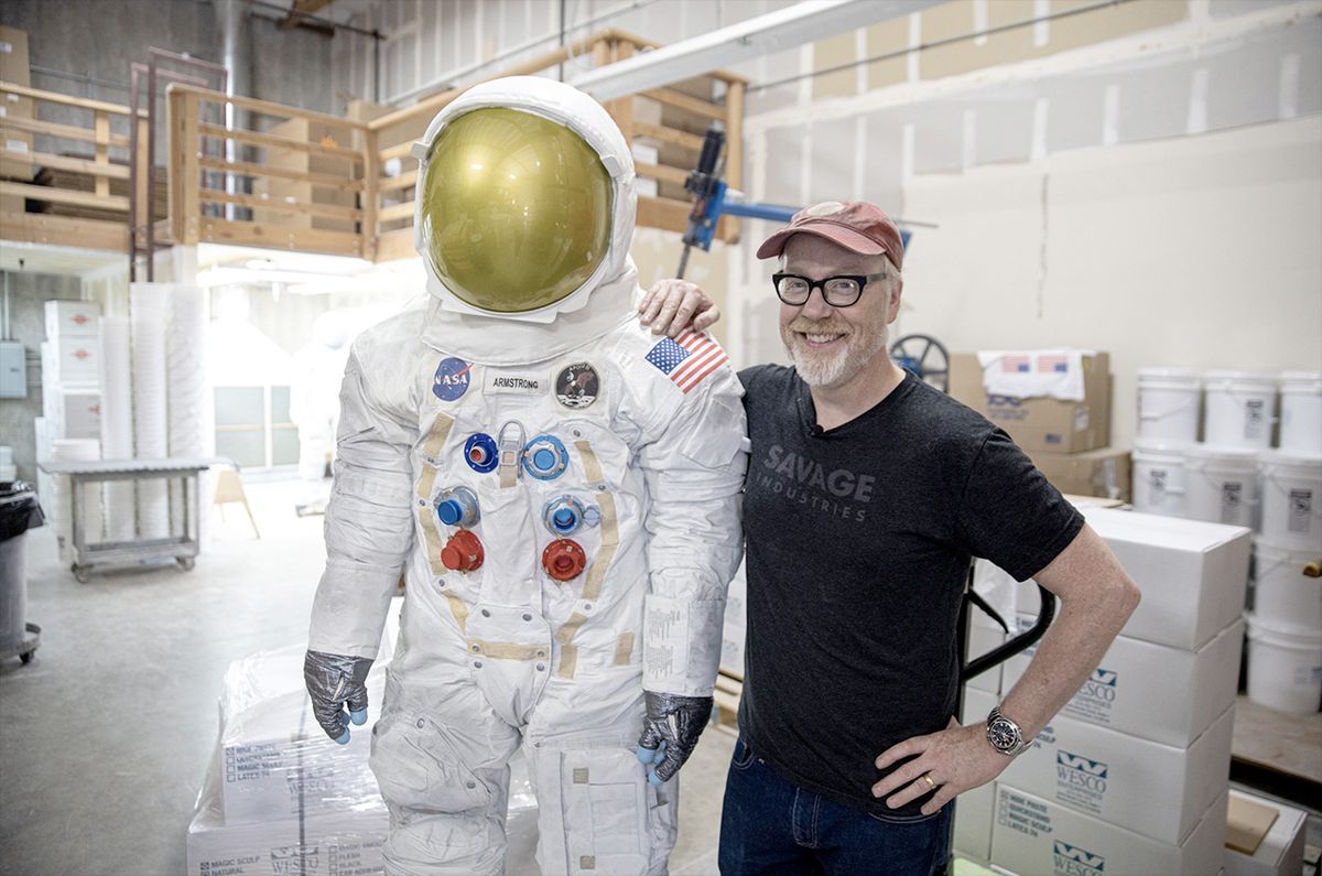 Adam Savage, posing with a 3D printed statue of Neil Armstrong&#039;s spacesuit, will assemble a full-size replica of an Apollo spacecraft crew hatch for the National Air and Space Museum.