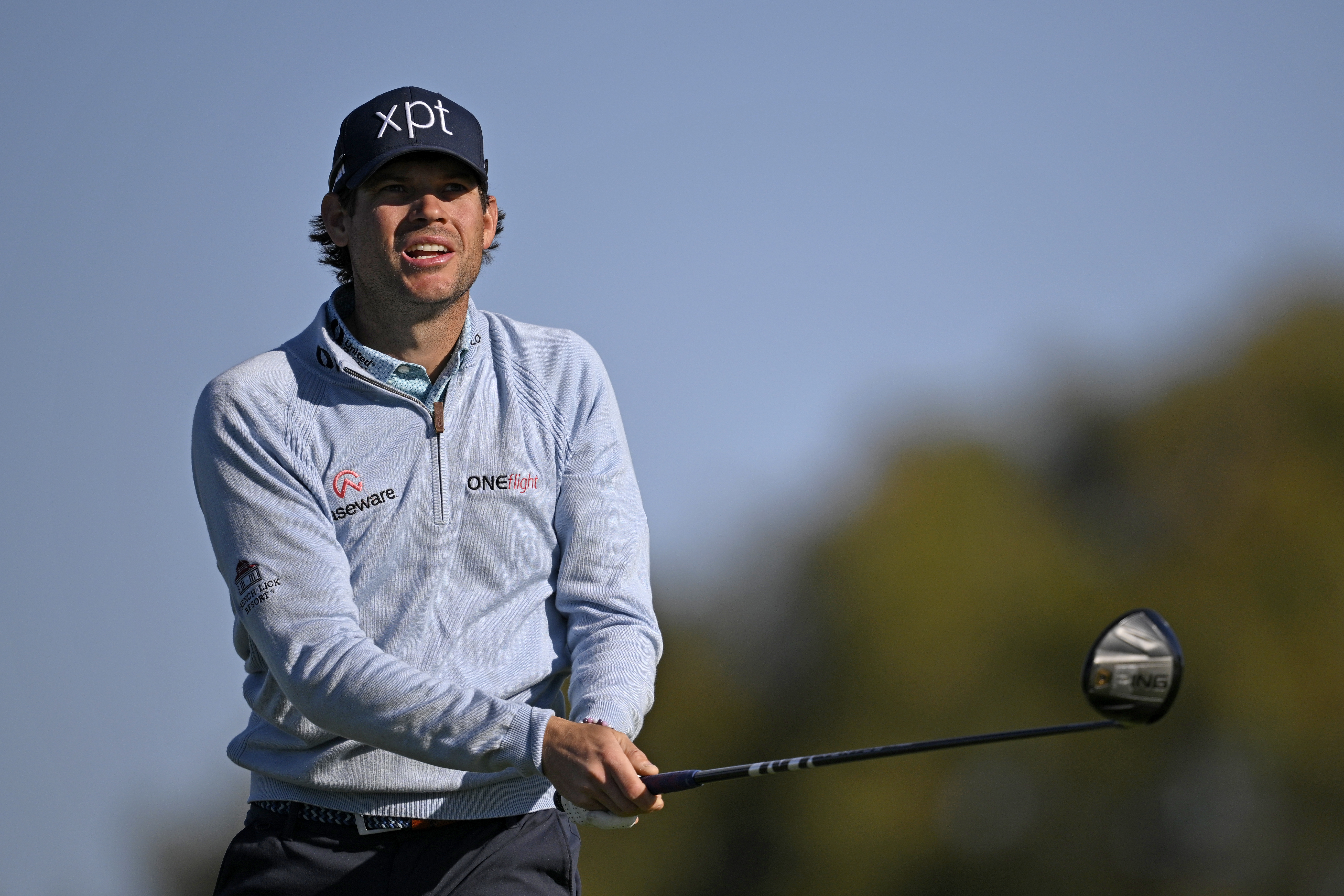 Adam Schenk hits a driver off the tee