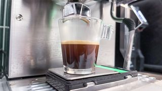 A shot of espresso being poured