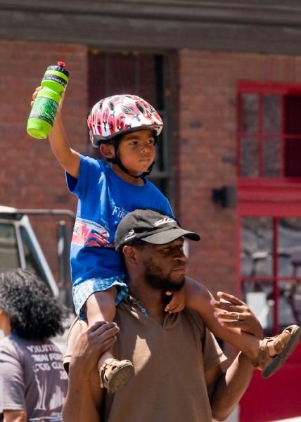 This little fan was willing to share his bottle with the racers.