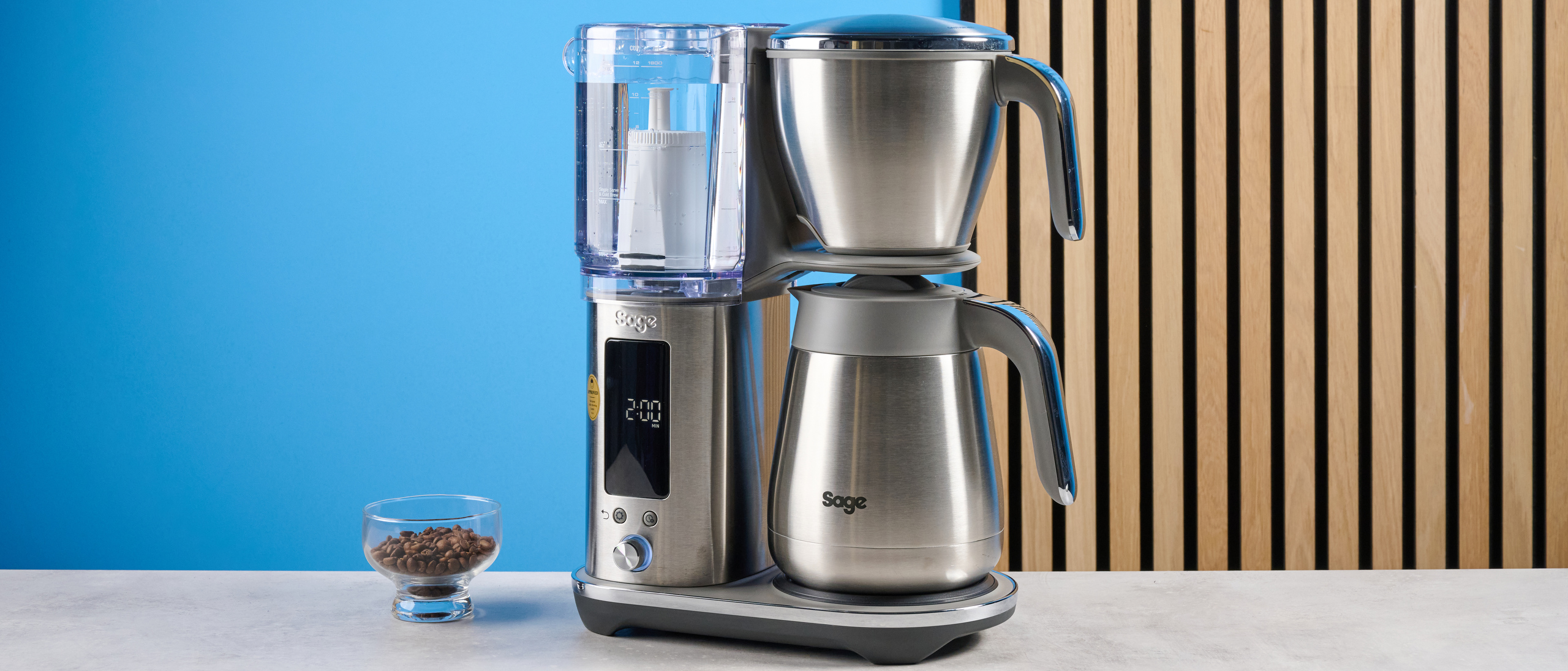 the breville luxe brewer (sage luxe brewer in the UK) thermal carafe version with a silver metal carafe and filter basket and removable plastic water tank showing the range of filter baskets and paper filters with a dial to control brew