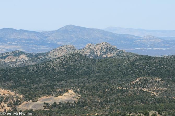 A rider approaches the top of the climb before the Skull Valley descent
