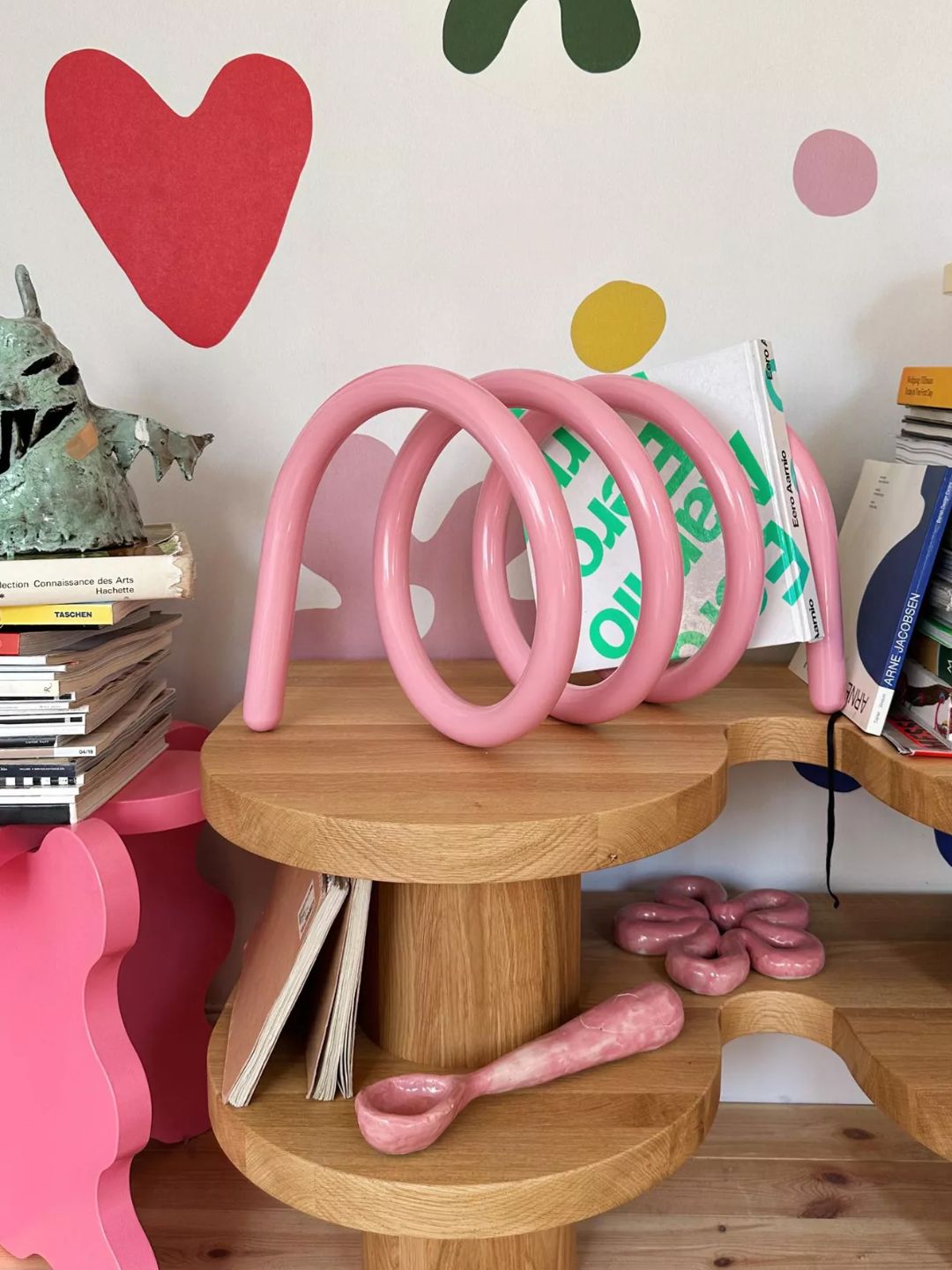 A pink metal spiral stand from Gustaf Westman