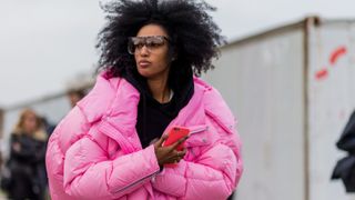 Julia Sarr Jamois wearing a pink down jacket seen outside Gucci during Milan Fashion Week Fall/Winter 2016/17 on February 24, 2016 in Milan, Italy