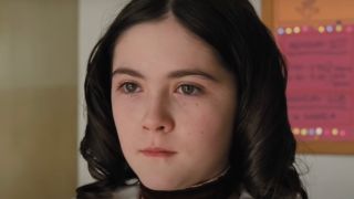 Isabelle Fuhrman stands crying in a classroom in Orphan.