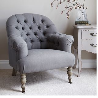 linen button back armchair