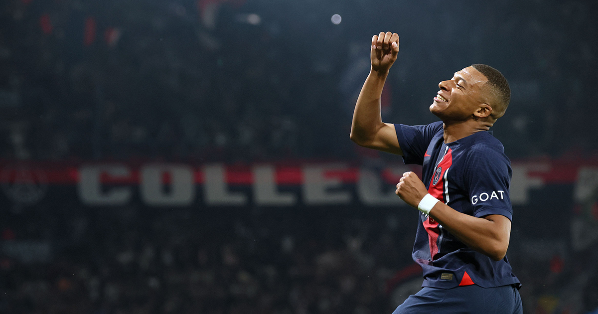  PSG superstar and Exact Madrid target Kylian Mbappe punches the air as he celebrates scoring Paris Saint-Germain's third goal at some level of the French L1 soccer match between Paris Saint-Germain (PSG) and RC Lens on the Parc des Princes Stadium in Paris on August 26, 2023.