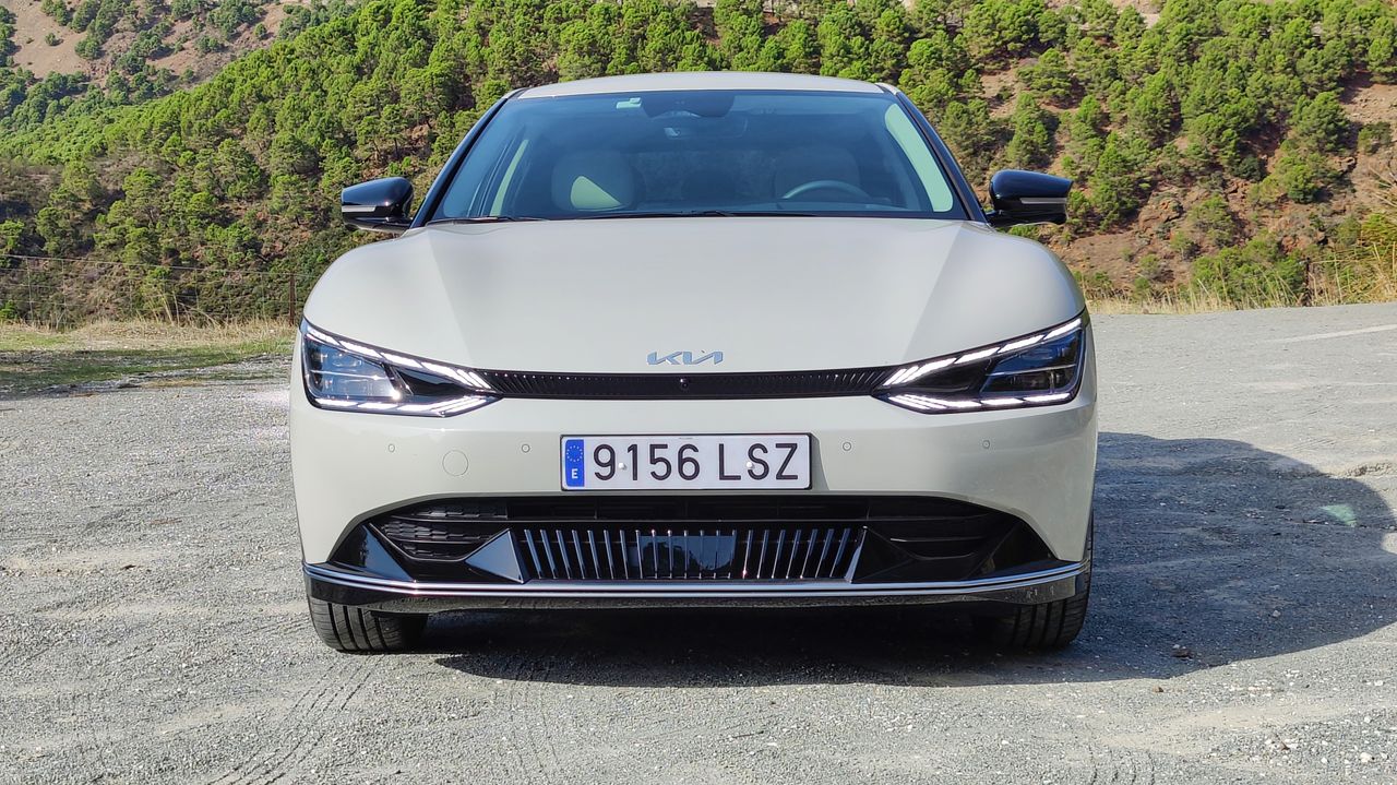 Front on view of Kia EV6 parked in a layby in the mountains