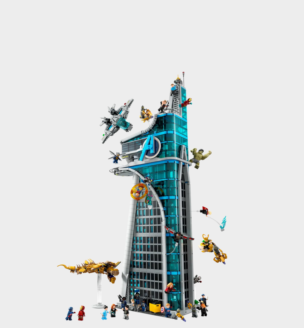 Lego Avengers Tower and minifigures against a plain background