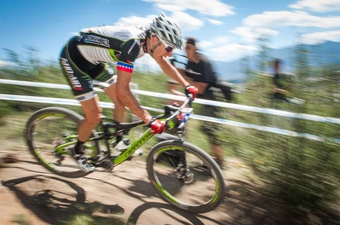 A Sho-Air Cannondale rider makes his way down a twisty descent during the early laps of the elite men's race..