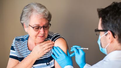 Woman getting vaccinated