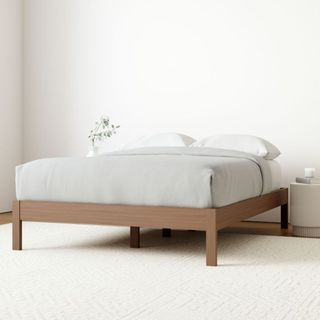 Simple Bed Frame against a white wal.
