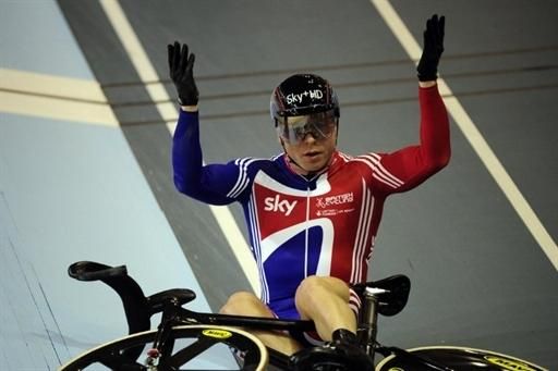 Chris Hoy (Great Britain) reacts after crashing in the men's keirin. The race was re-started and Malaysias Josiah Ng was DQ'd for interfering with Hoy.