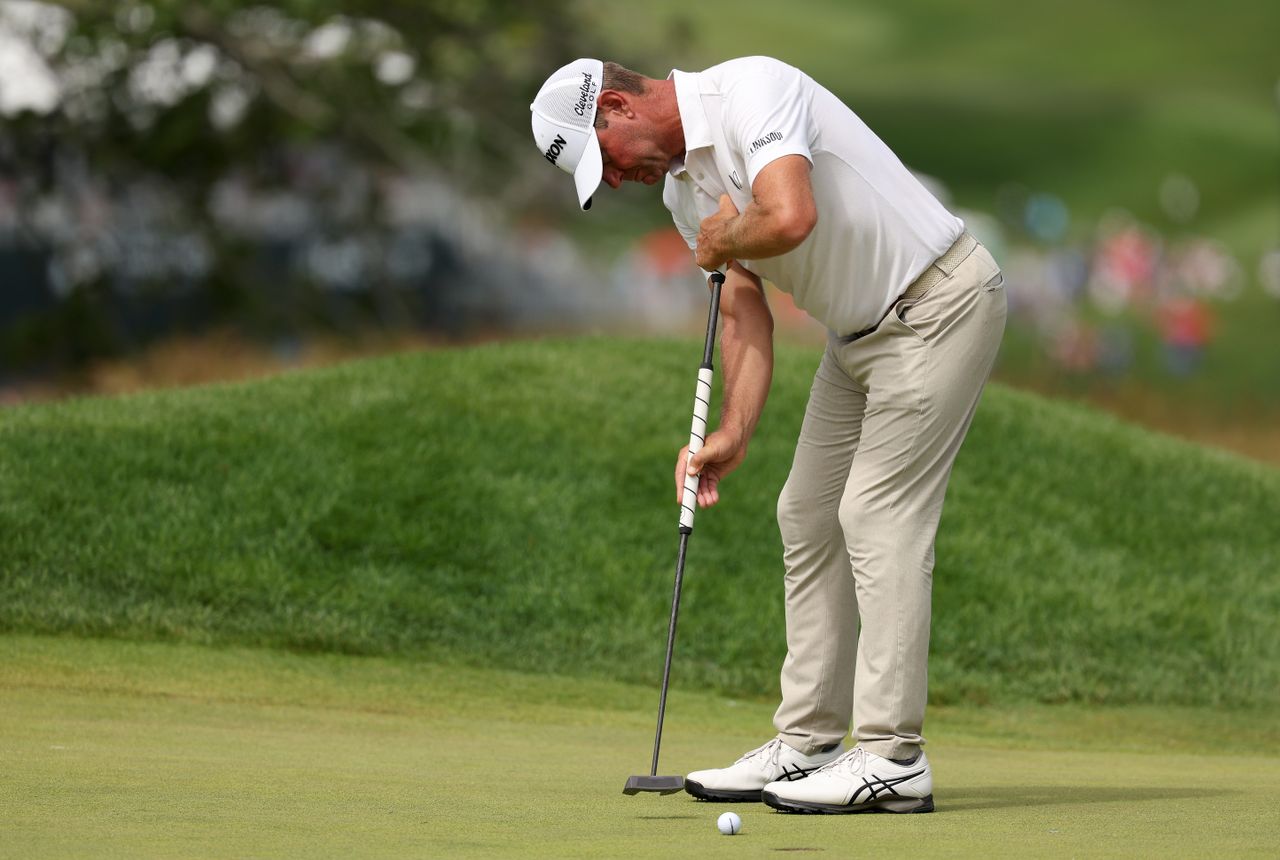 Lucas Glover strikes a putt
