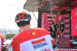 NAPOLI ITALY MAY 14 Thomas De Gendt of Belgium and Team Lotto Soudal celebrates winning the stage on the podium ceremony after the 105th Giro dItalia 2022 Stage 8 a 153km stage from Napoli to Napoli Giro WorldTour on May 14 2022 in Napoli Italy Photo by Tim de WaeleGetty Images