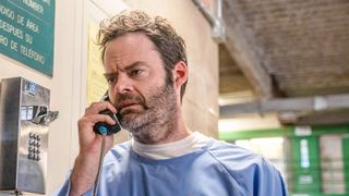 Bill Hader as Barry, talking at a jail payphone, in Barry season 4 episode 1
