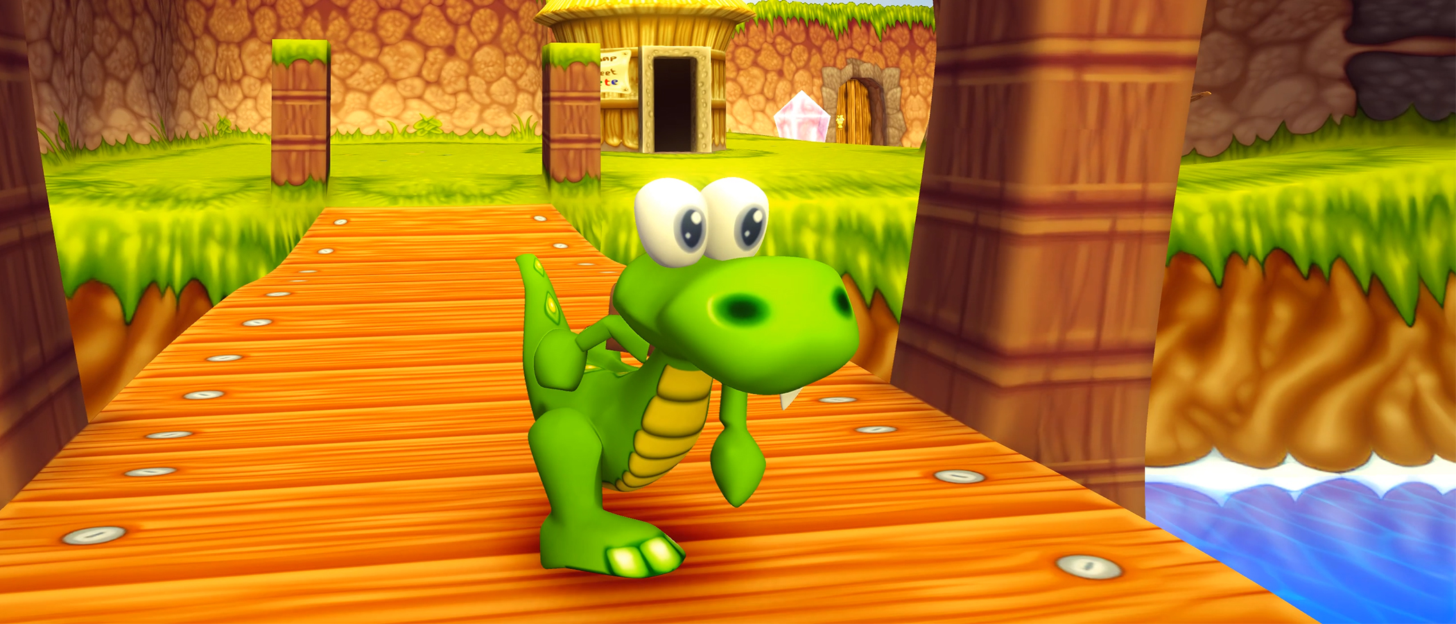 A bright green cartoon crocodile in the retro game Croc 2