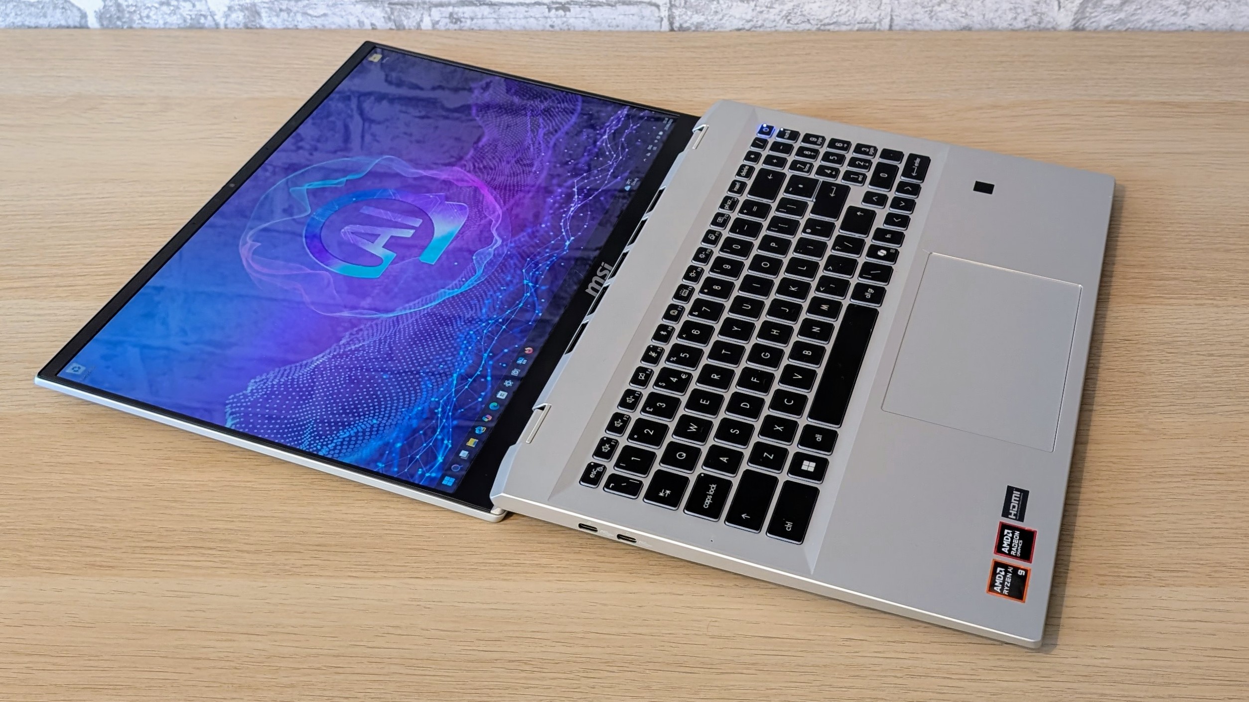 The MSI Prestige A16 AI+ on a desk