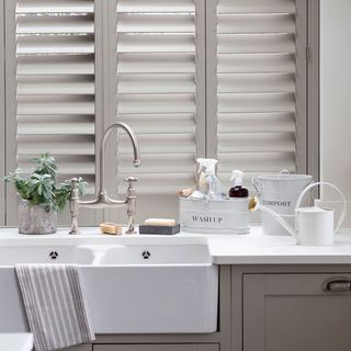 country utility room with shutters