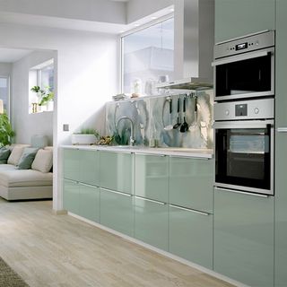 kitchen with green gloss unit