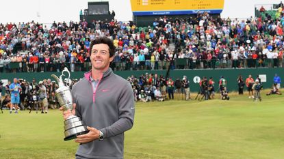 Rory McIlroy holds the Claret Jug at Royal Liverpool