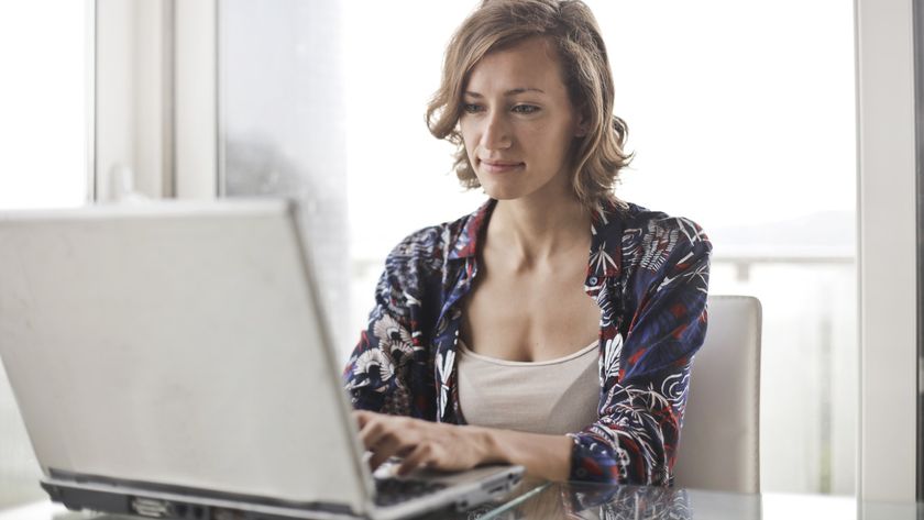 woman listening to computer