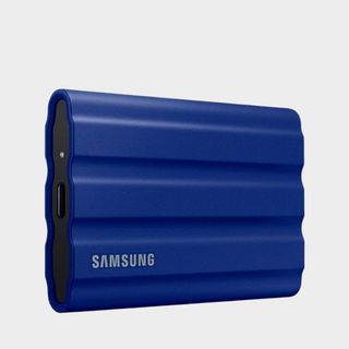 Samsung T7 Shield blue on a grey background