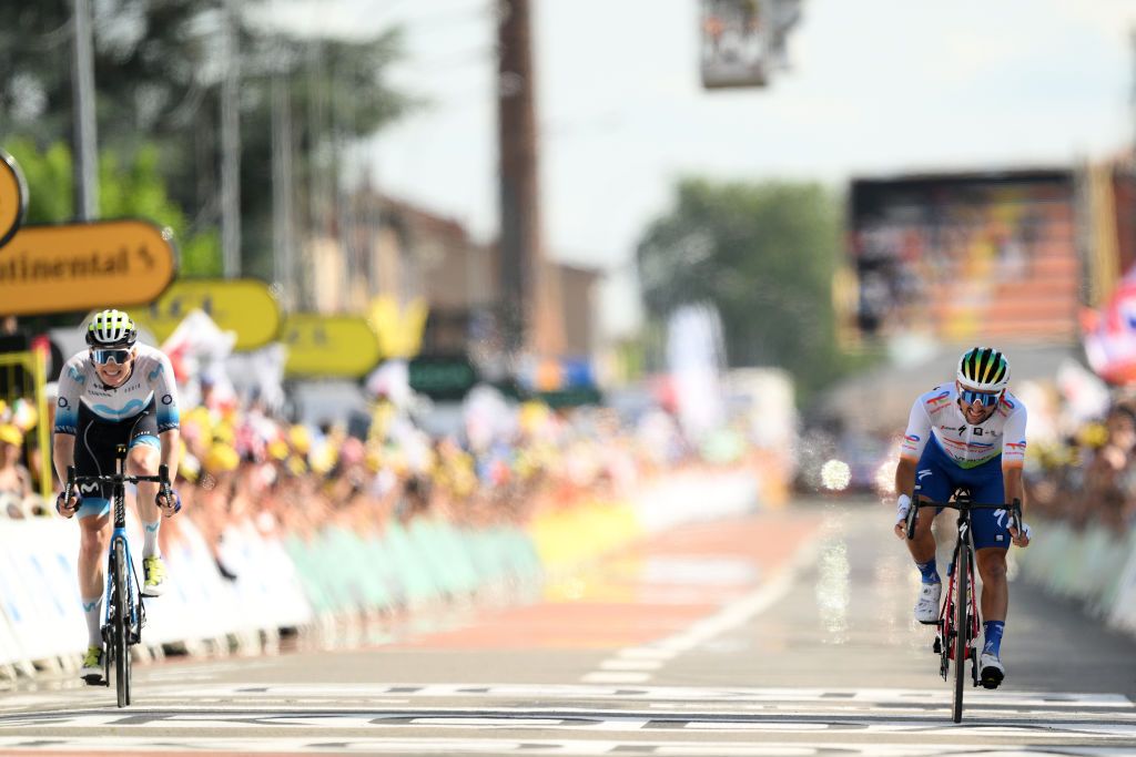 BELLEVILLEENBEAUJOLAIS FRANCE JULY 13 LR Matteo Jorgenson of The United States and Movistar Team and Mathieu Burgaudeau of France and Team TotalEnergies sprint at finish line during the stage twelve of the 110th Tour de France 2023 a 1688km stage from Roanne to Belleville en Beaujolais UCIWT on July 13 2023 in Belleville en Beaujolais France Photo by David RamosGetty Images