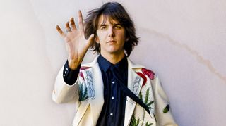 Gram Parsons poses in his Nudie suit circa 1969