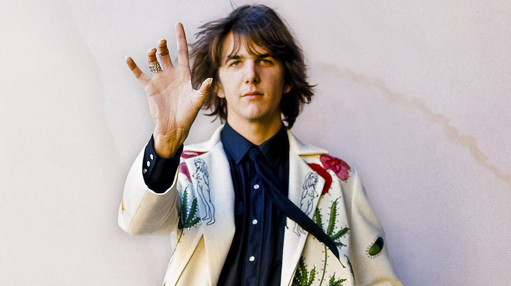 Gram Parsons poses in his Nudie suit circa 1969