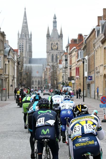 The peloton heads through Ypres
