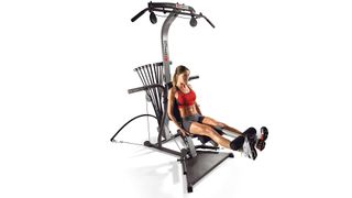 Bowflex Xtreme 2 SE review: An image showing a woman using the system to build muscle in her thighs