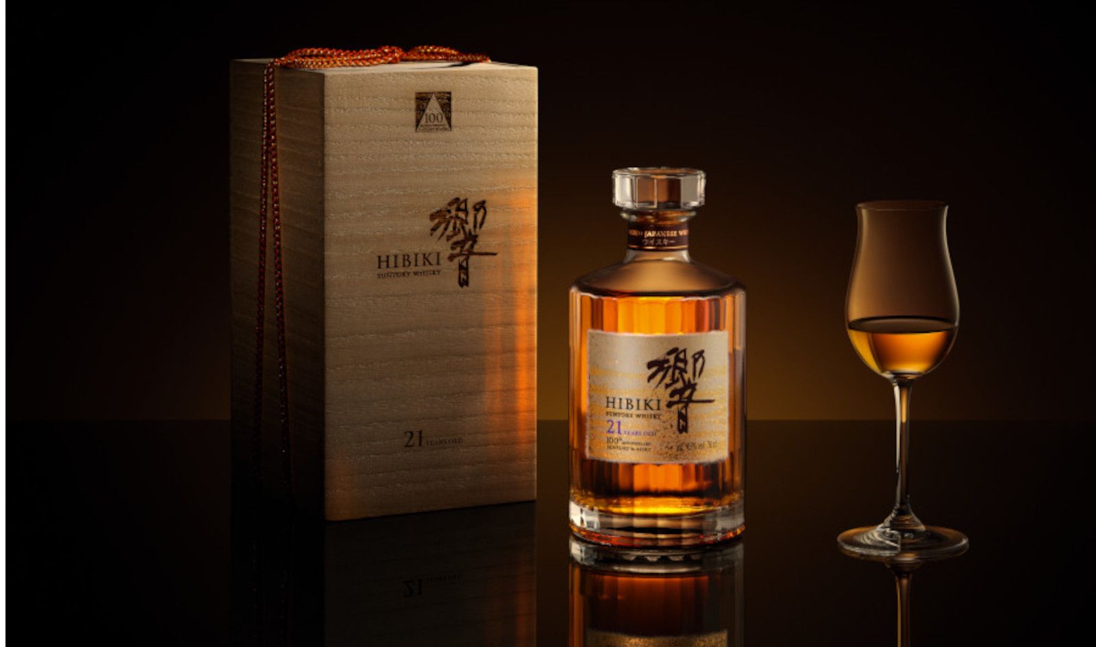 whisky bottle and glass and case