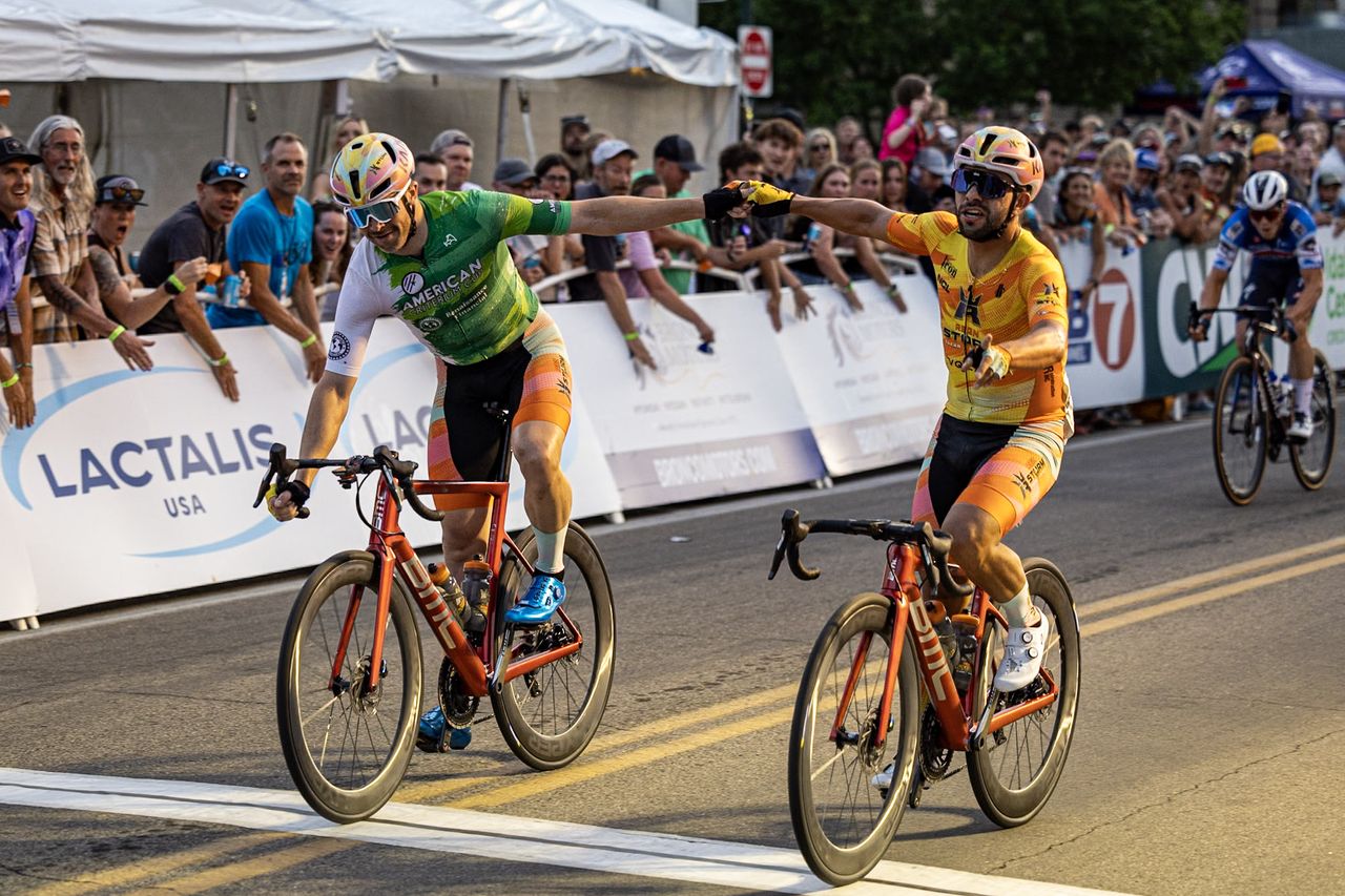 Criterium winner Jordan Parra rides next to runner-up and REIGN Storm Racing teammate Danny Summerhill, wearing the green sprint jersey of the American Criterium Cup series